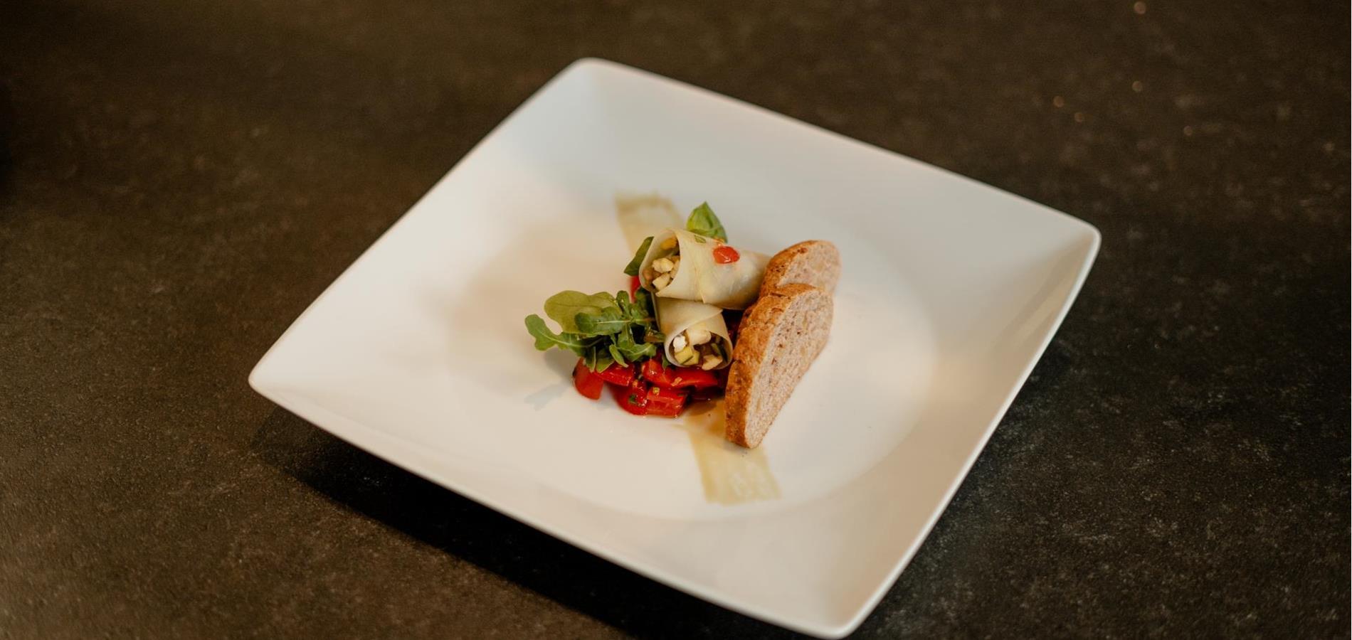 Kohlrabi Cannelloni with Fresh Tomato Ragout and Arugula