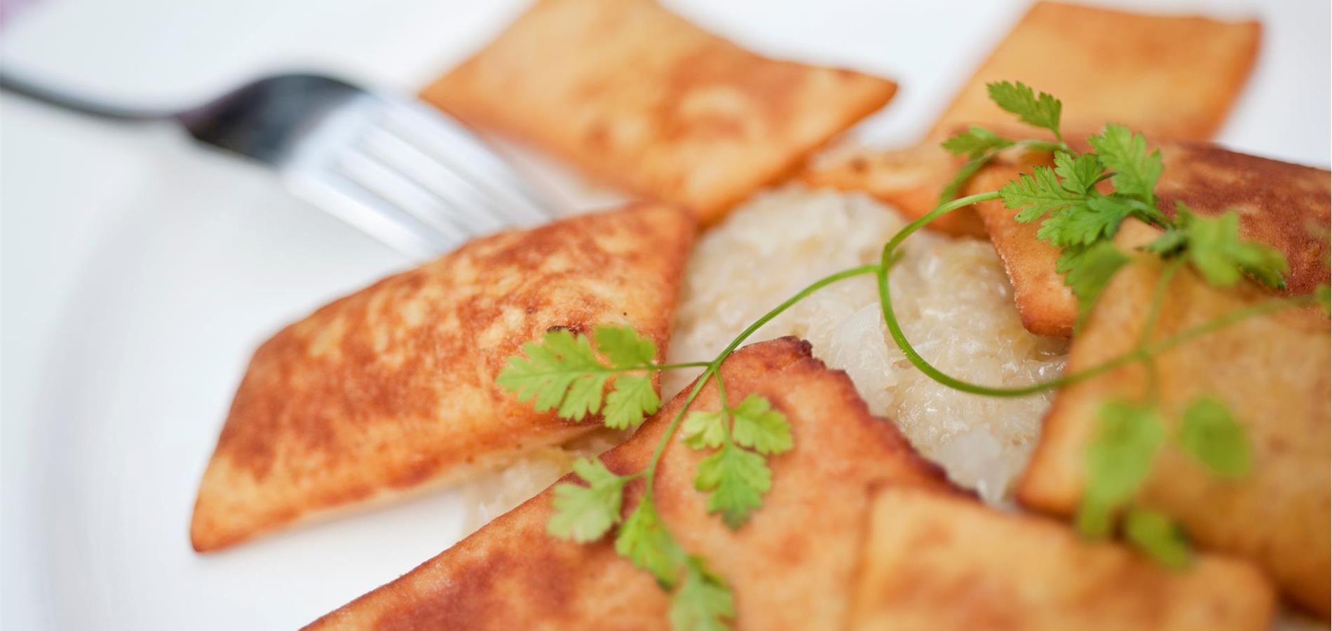 Kartoffelblattlen con crauti